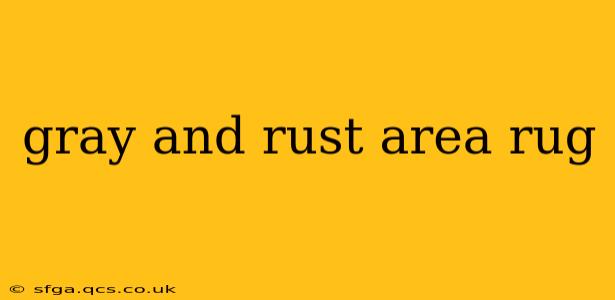 gray and rust area rug