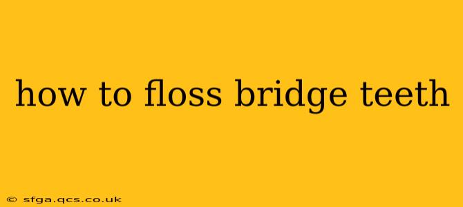 how to floss bridge teeth